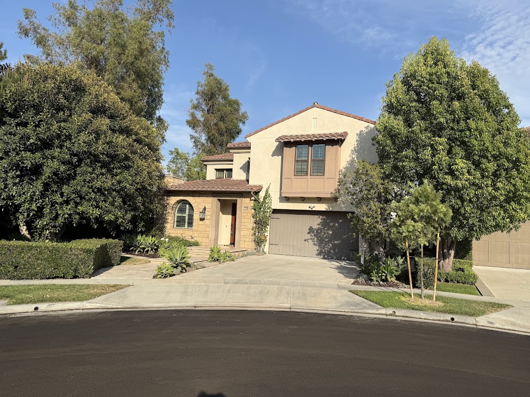 Exterior front view of 71 Clocktower, a Woodbury home in Irvine, California, sold at $3,925,000 with buyer representation by Debbie Sagorin, Coldwell Banker Realty.