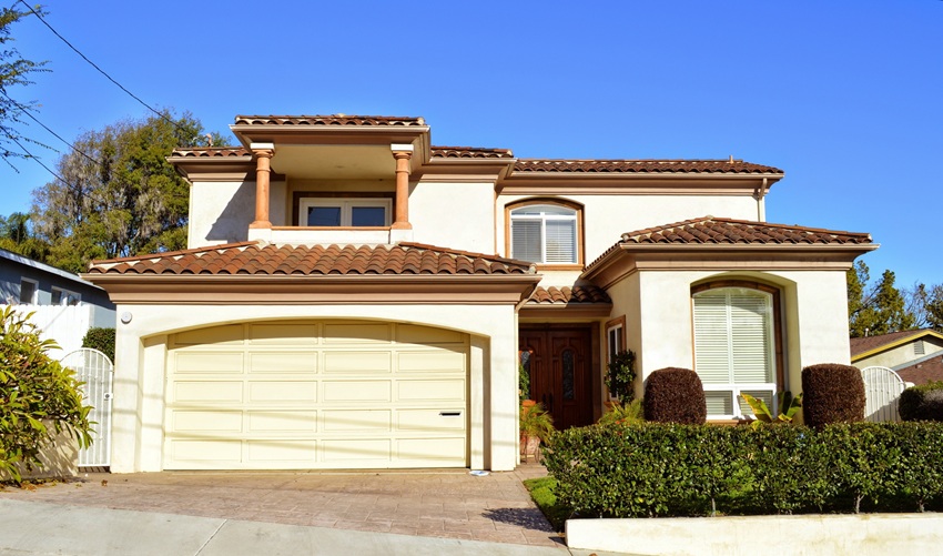 Mediterranean-style two-story home in Orange County, California - representing a typical property with seller closing costs including transfer tax, escrow, title insurance, and HOA fees